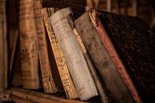 Image of old books standing next to each other